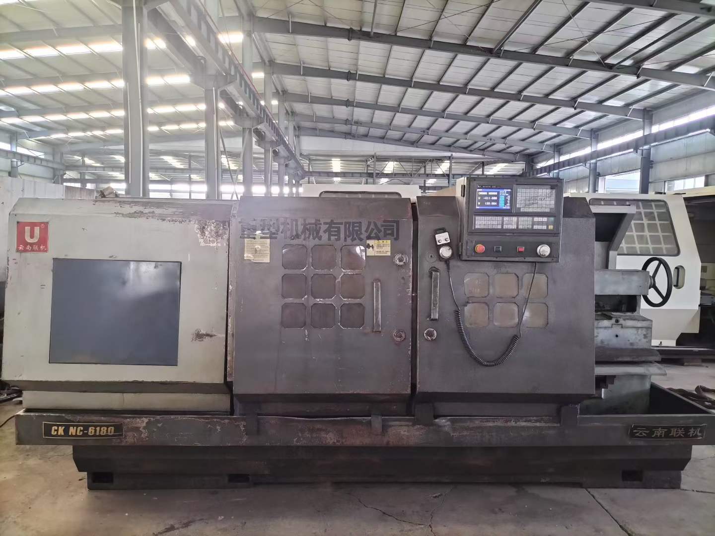 Máy tiện Yunnan 6180 đã qua sử dụng với khoảng cách tâm 1.5 m và truyền động biến tần