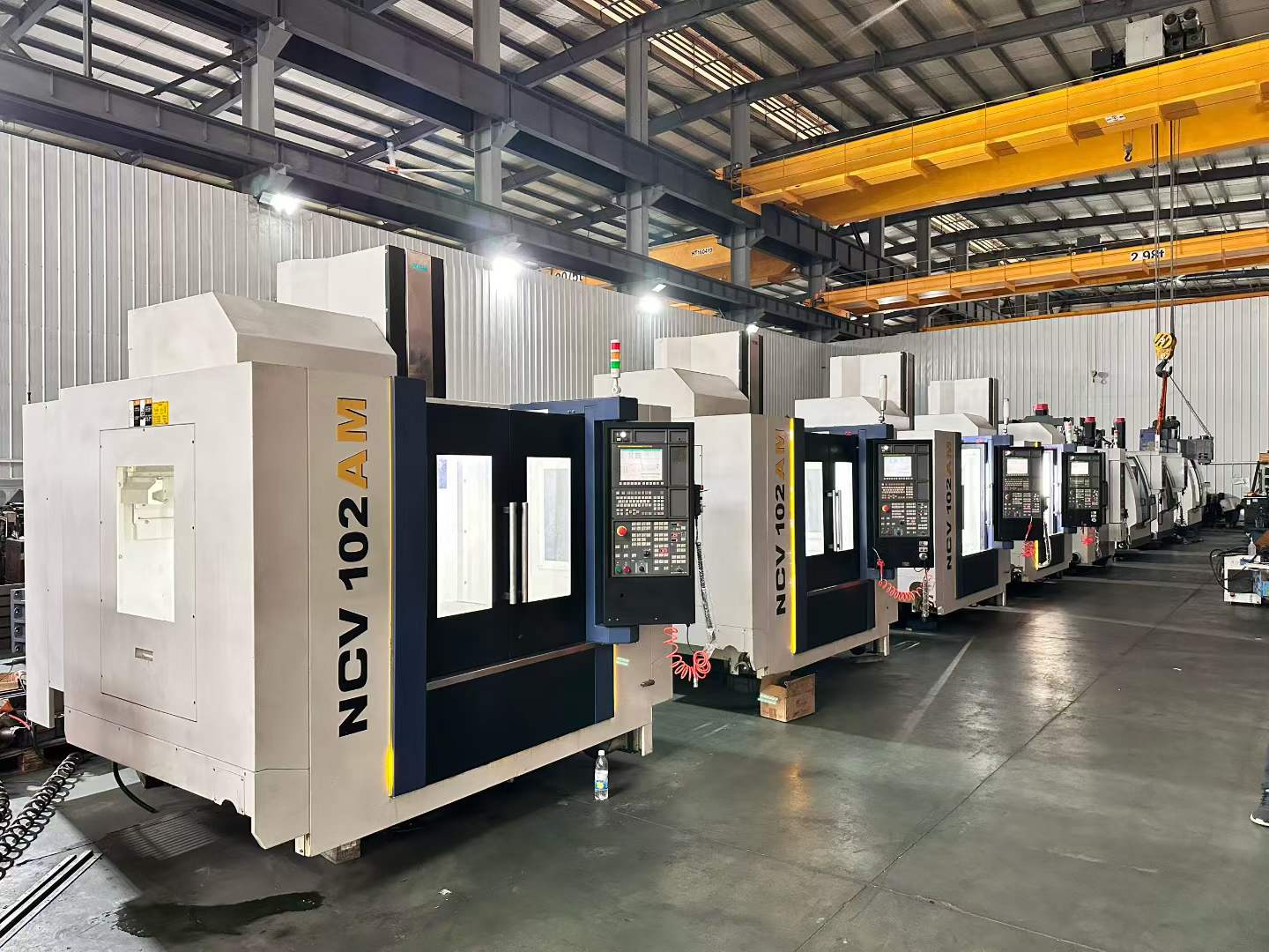 مركز تصنيع رأسي YCM NCV 102 AM مستعمل مع FANUC MXP-200 FA