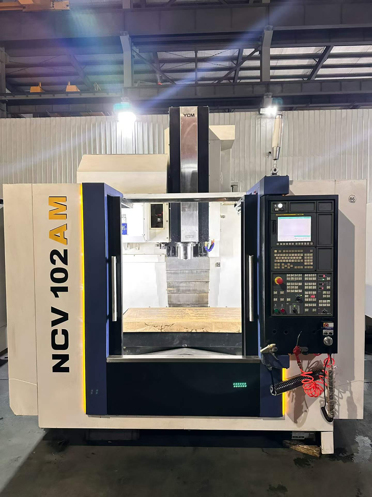 Used YCM NCV 102 AM Vertical Machining Center with FANUC MXP-200 FA photo 2