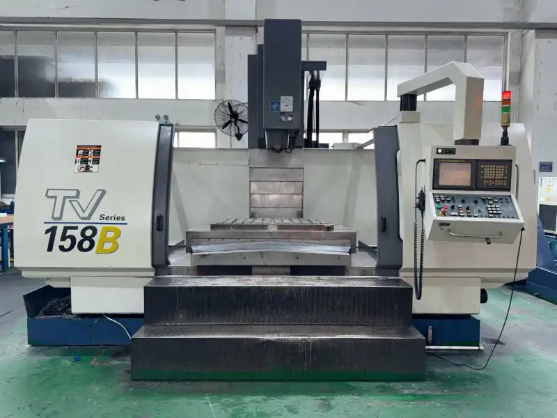 Used YCM TV 158 B Vertical Machining Center with FANUC MXP-200 i photo 1