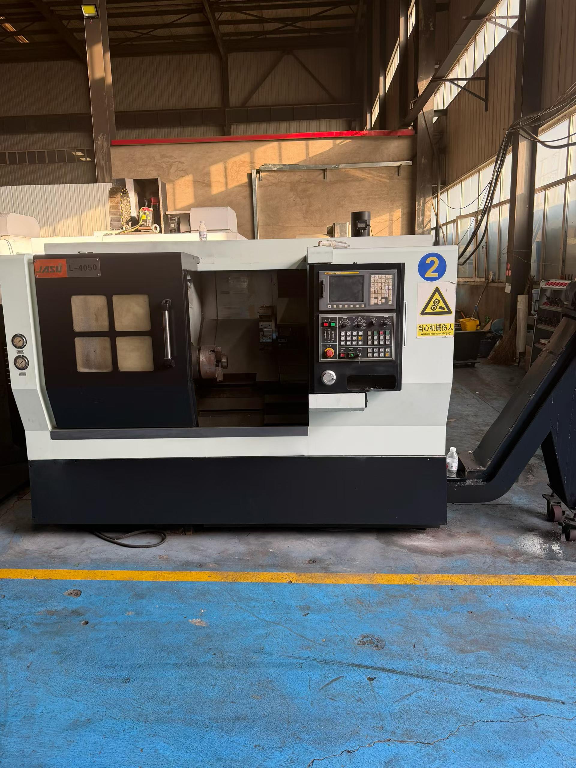 Used CNC Lathe with FANUC Control, Tailstock and Chip Conveyor