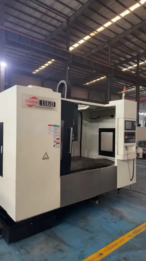 Centro de mecanizado vertical Tuofeng 1160 usado con husillo BT40, recorrido X 1100 / Y 600 / Z 600