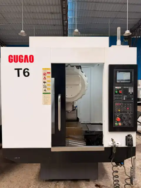 เครื่องแมชชีนนิ่งเซ็นเตอร์แนวตั้ง GUGAO T 6 มือสองพร้อมระบบควบคุม Mitsubishi M 80