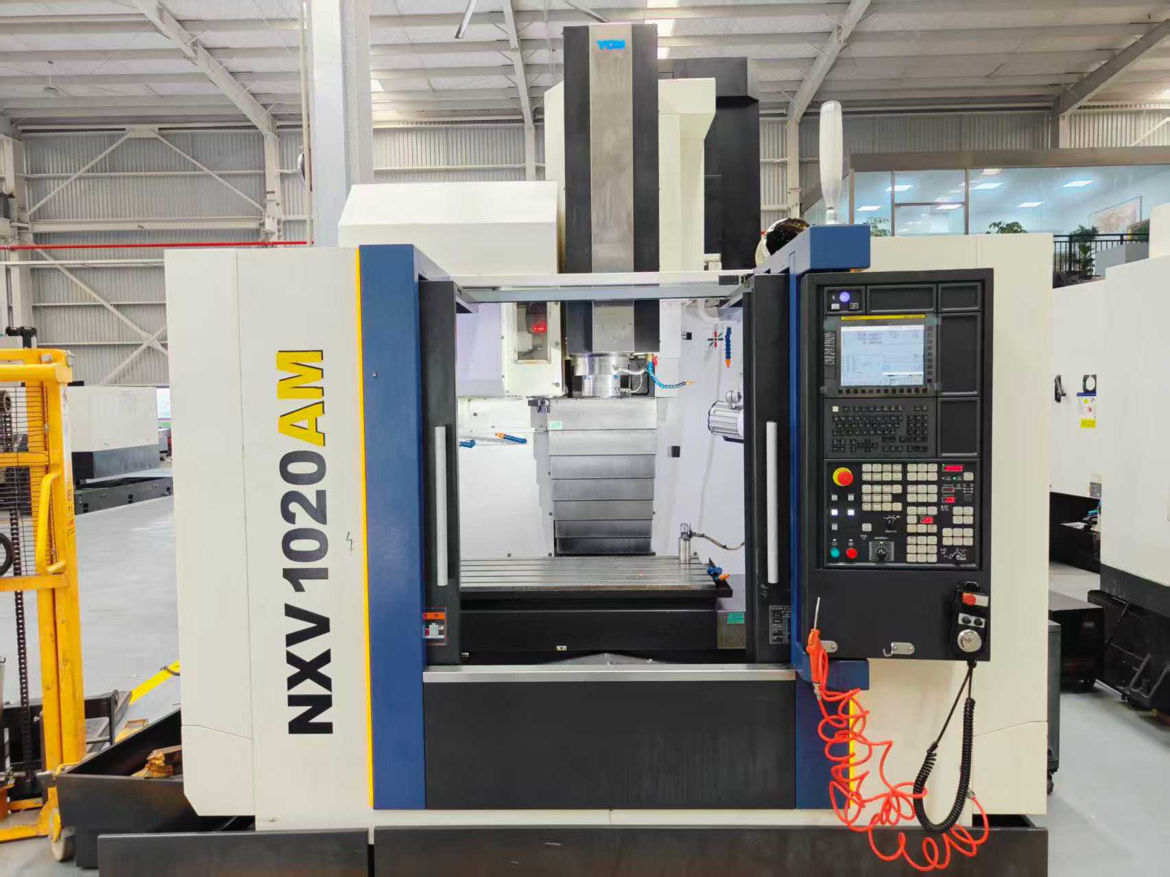Used YCM NXV-1020 AM Machining Center with FANUC MXP-200 FB+