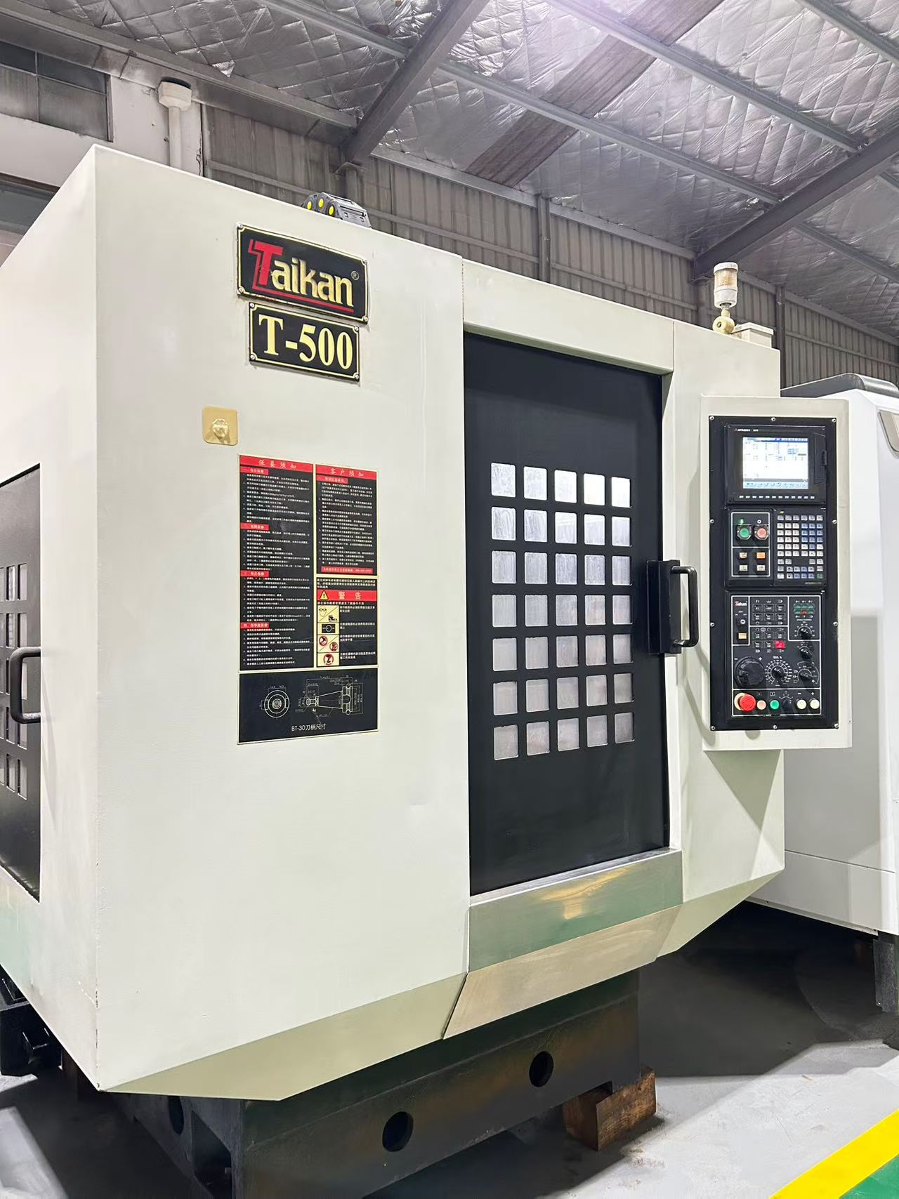 Used Taikan T 500 Drilling/Tapping Center with Mitsubishi M 70 CNC Control