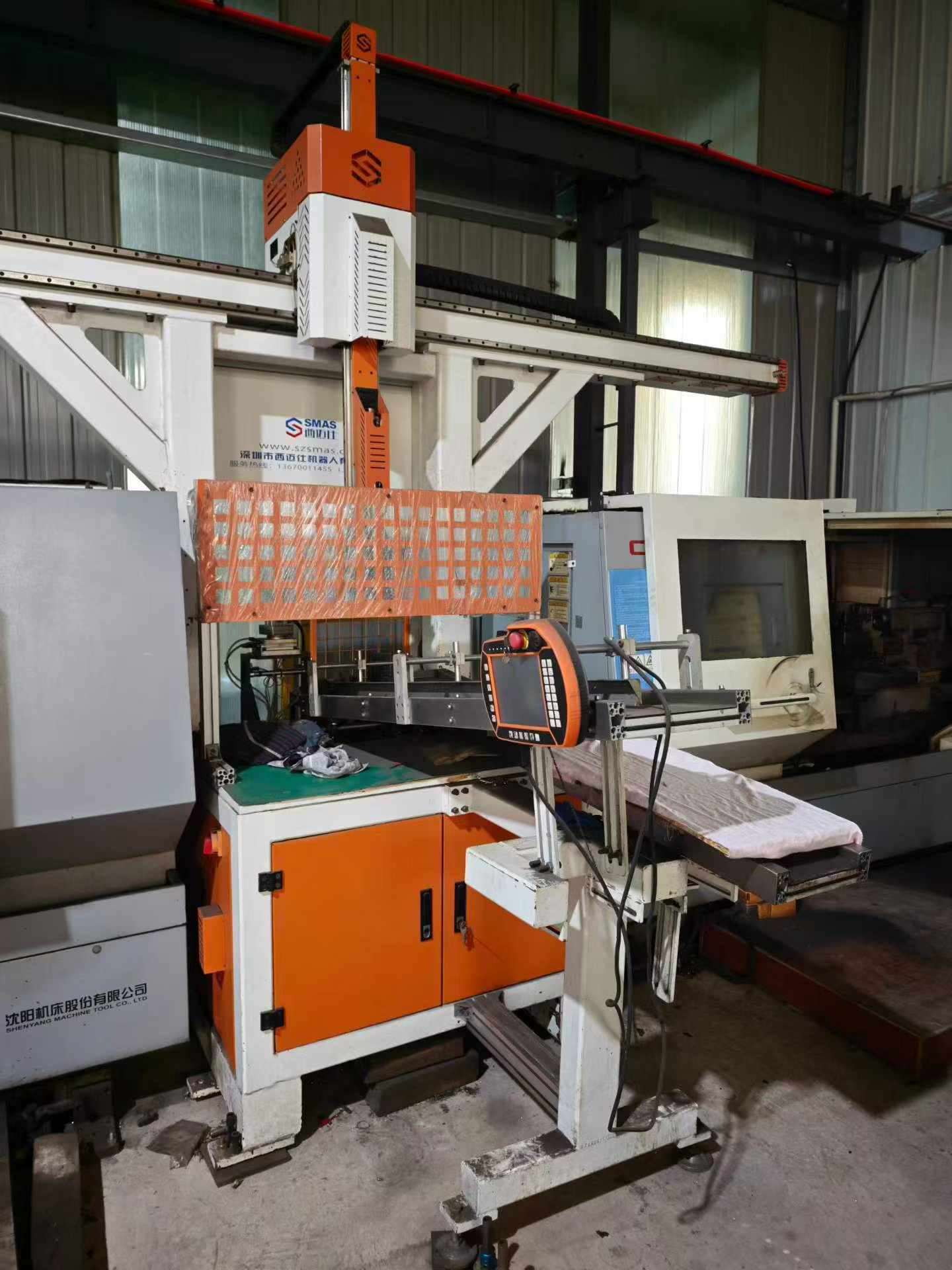 Used Turn-Mill CNC Lathe with Dual-Station Automatic Robot Loader photo 2
