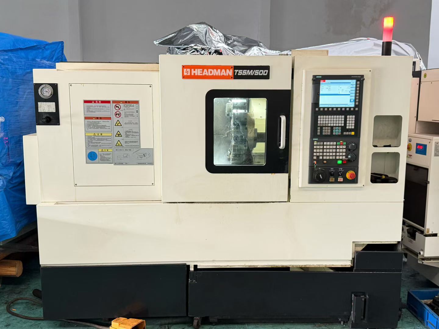 Used HEADMAN T 55 M/500 Turn-Mill CNC Lathe with Siemens 828 D photo 2