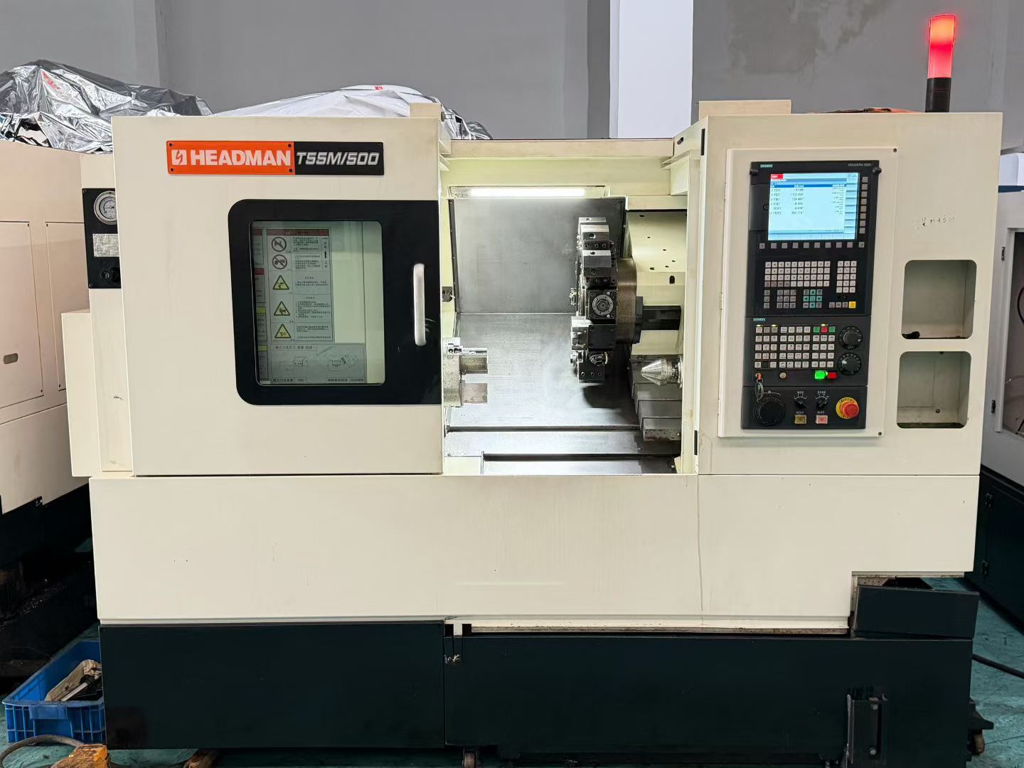 Used HEADMAN T 55 M/500 Turn-Mill CNC Lathe with Siemens 828 D photo 3