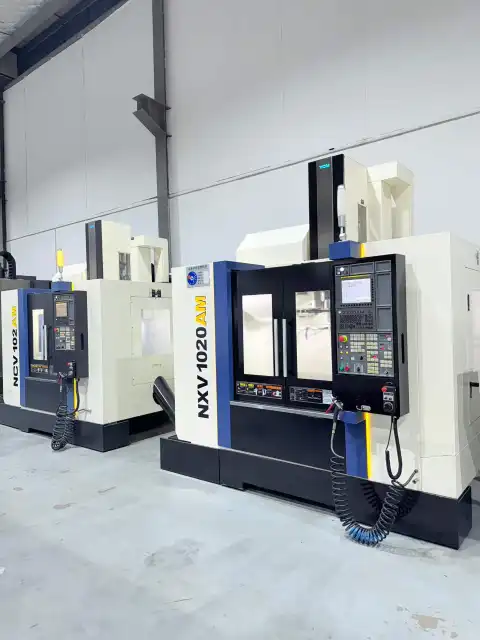 Used YCM NCV 102 AM Vertical Machining Center with FANUC MXP-200 FB Control
