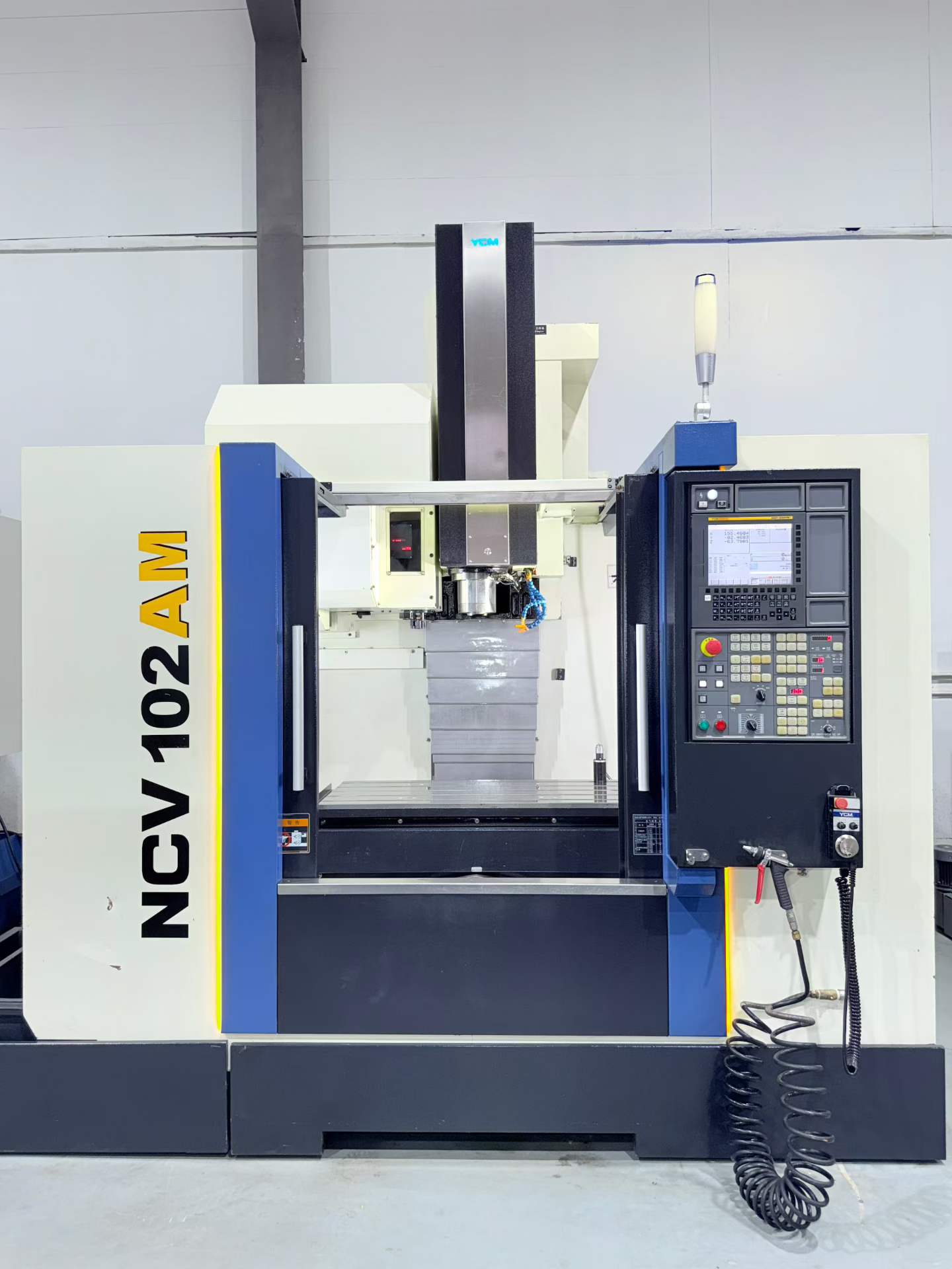 Used YCM NCV 102 AM Vertical Machining Center with FANUC MXP-200 FB Control photo 2