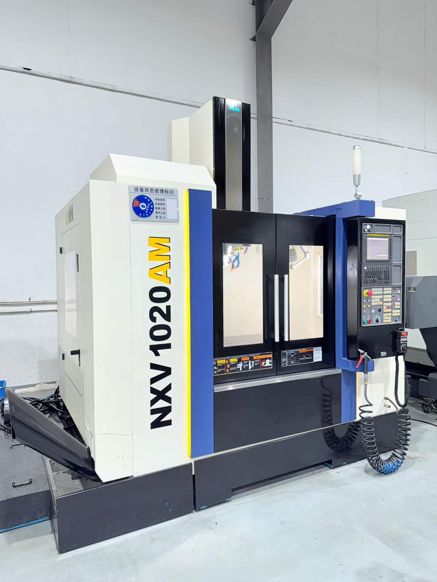 Used YCM NCV 102 AM Vertical Machining Center with FANUC MXP-200 FB Control photo 3