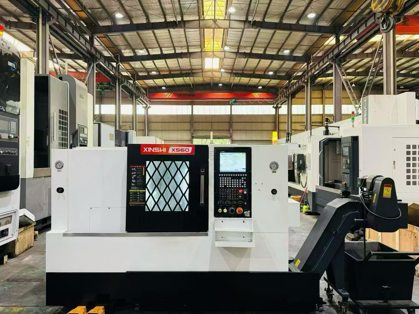 2025 Used Xinshi X 560 Slant-Bed Turret-Type CNC Lathe with LNC Absolute-Value Control, 8-Station Servo Turret & 15 kW Motorized Spindle photo 2