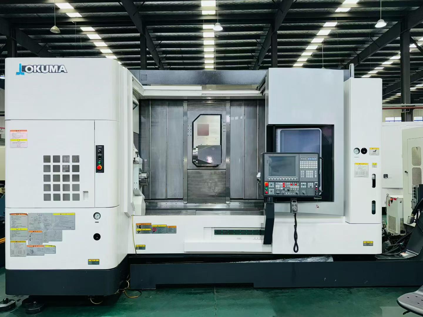 Used Okuma U 3000 5-Axis Turn-Mill Machining Center with OSP-P 300 SA-H photo 2