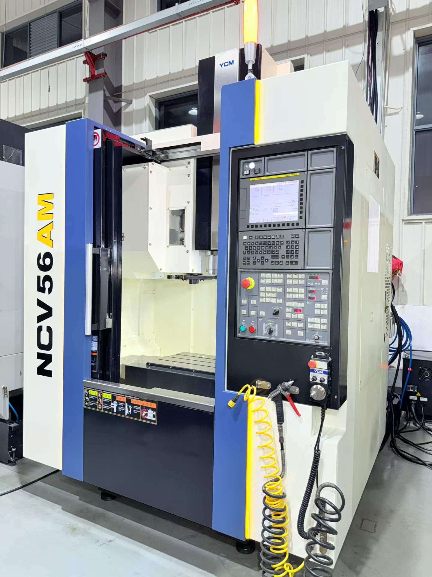 Used YCM NCV 56 AM Vertical Machining Center with FANUC MXP-200 FB+ Control photo 3