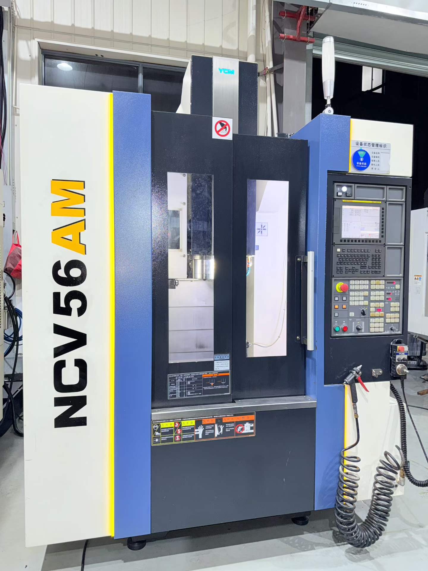 Used YCM NCV 56 AM Vertical Machining Center with FANUC MXP-200 FB+ Control photo 2