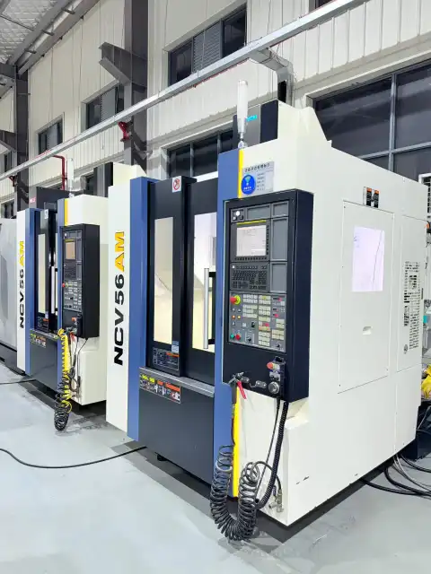 Used YCM NCV 56 AM Vertical Machining Center with FANUC MXP-200 FB+ Control