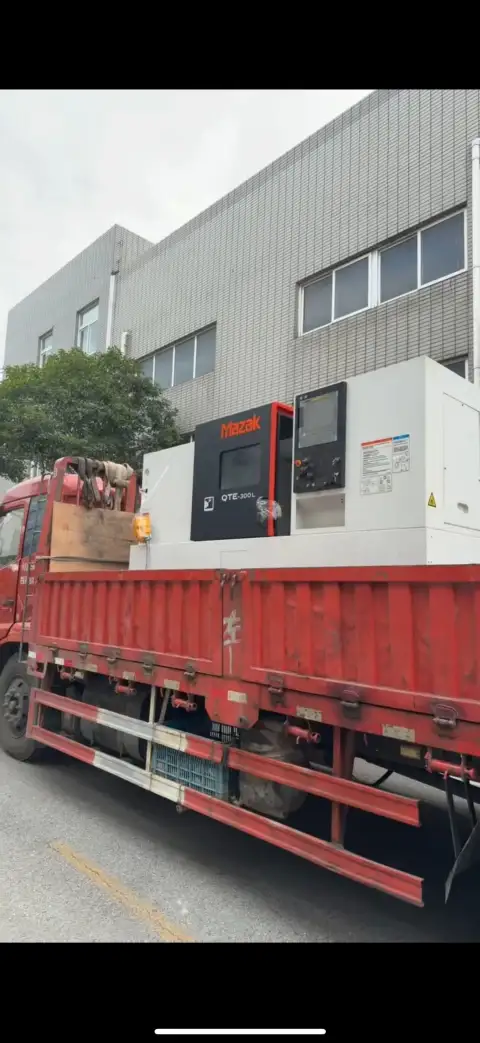 Torno horizontal CNC Mazak QTE-300 L usado con plato de 12 pulgadas