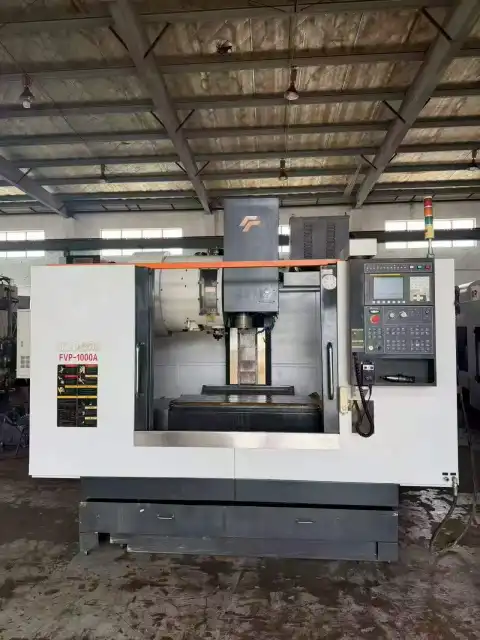 Centro de mecanizado vertical FEELER FVP-1000 A usado con control FANUC MD