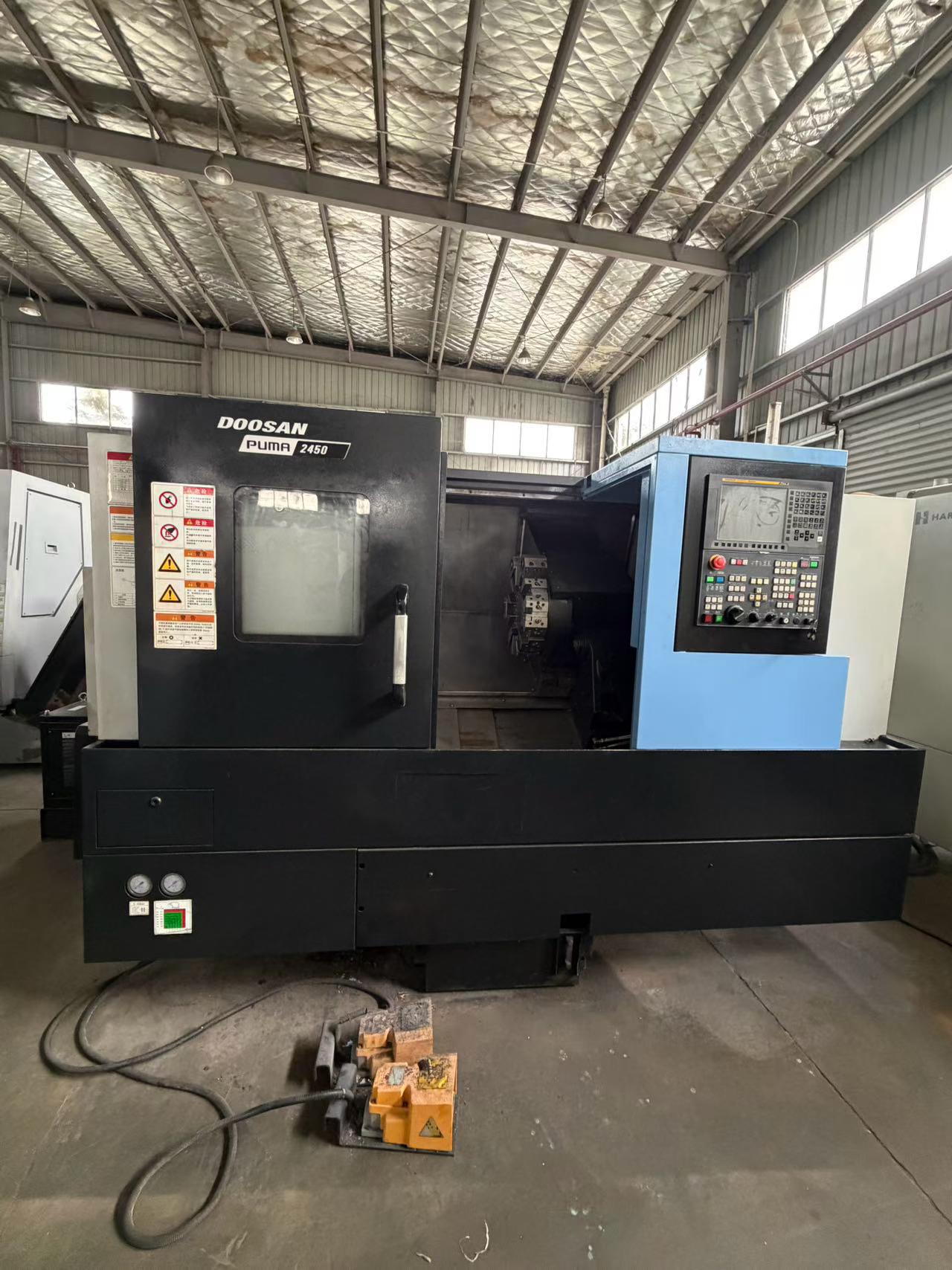 Used DN Solutions PUMA 2450 Slant-Bed CNC Lathe photo 2