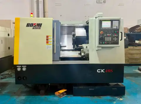 Used Baoji BOZHI CK 40 S Slant-Bed Turret-Type CNC Lathe with FANUC 0i Mate-TD