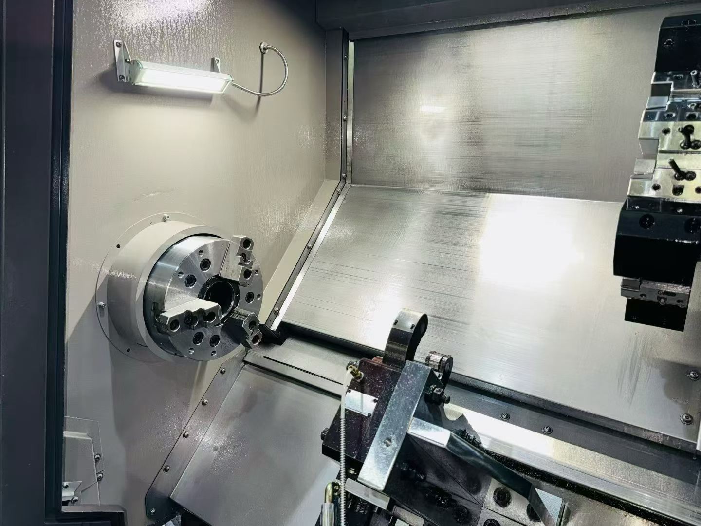 Used Shenyang T 5.2/1000 Slant-Bed Turret-Type CNC Lathe with FANUC 0i-TF Plus photo 4