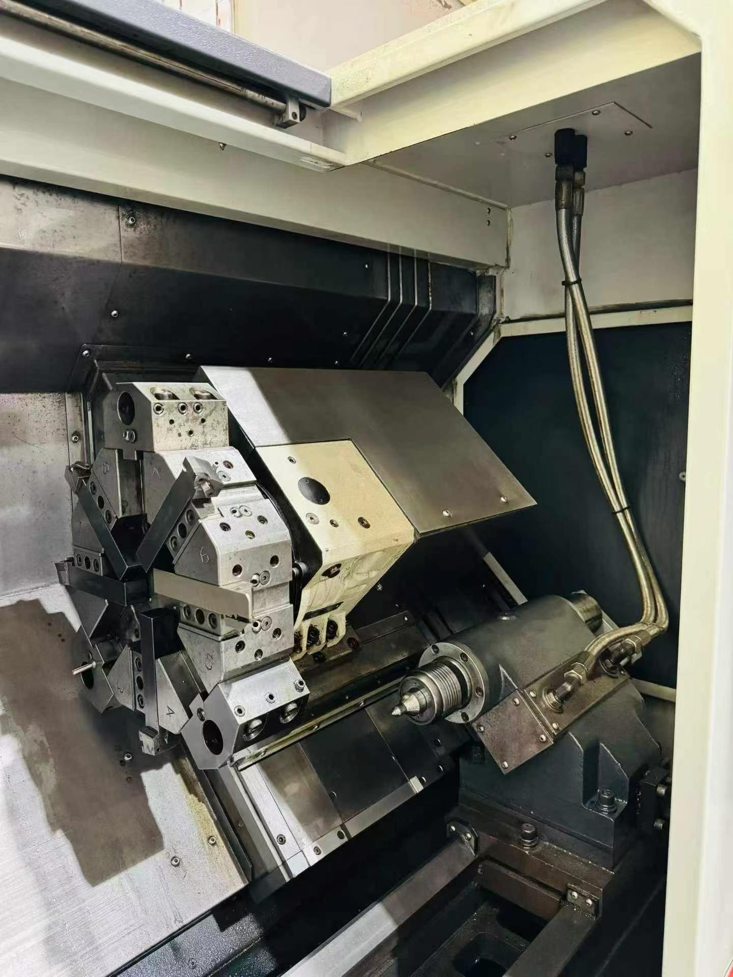 Used Hengda HL 202-T 360 Turret-Type CNC Lathe with KND K 1000 TCi-D Control photo 4