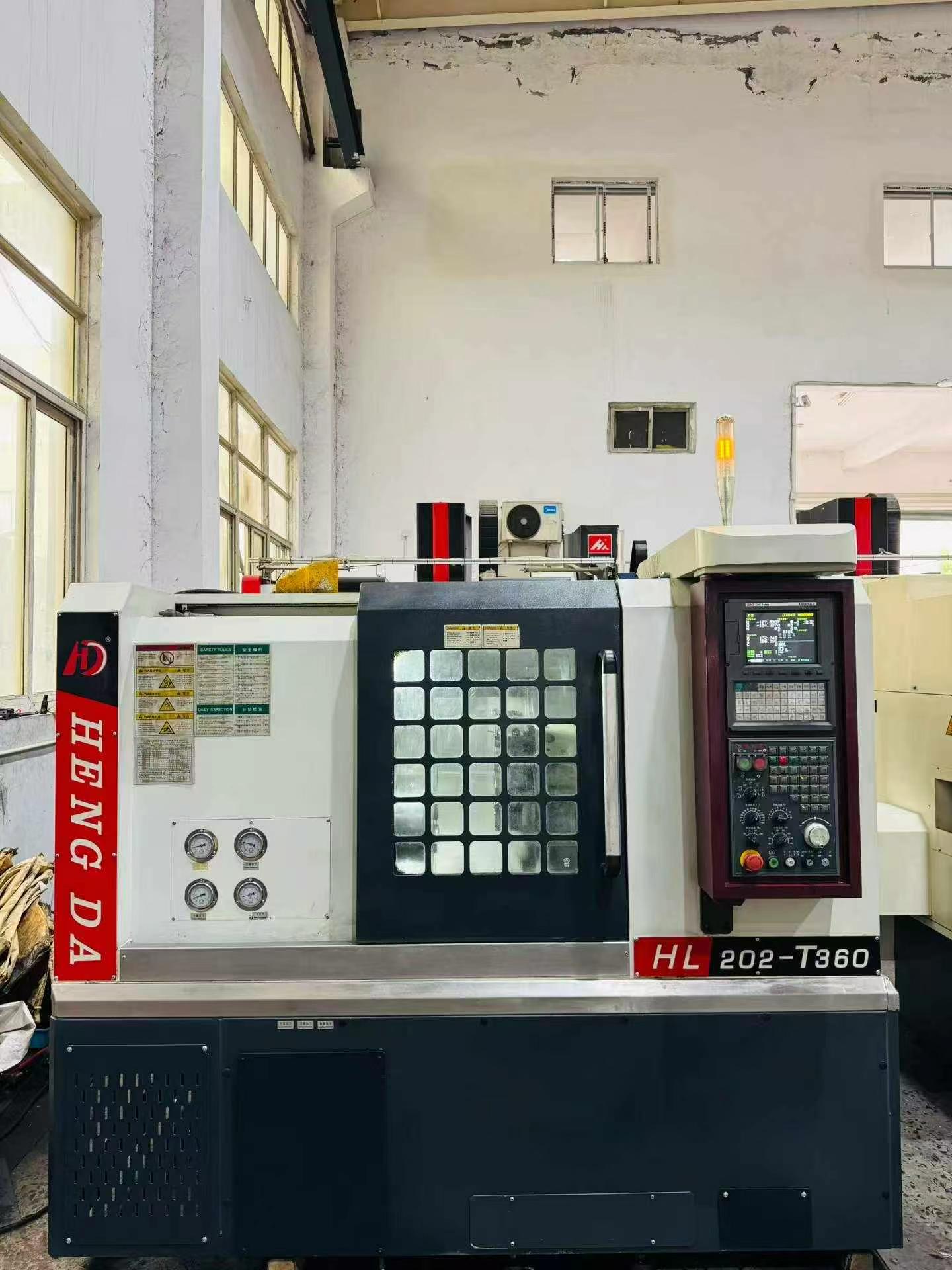 Used Hengda HL 202-T 360 Turret-Type CNC Lathe with KND K 1000 TCi-D Control photo 2