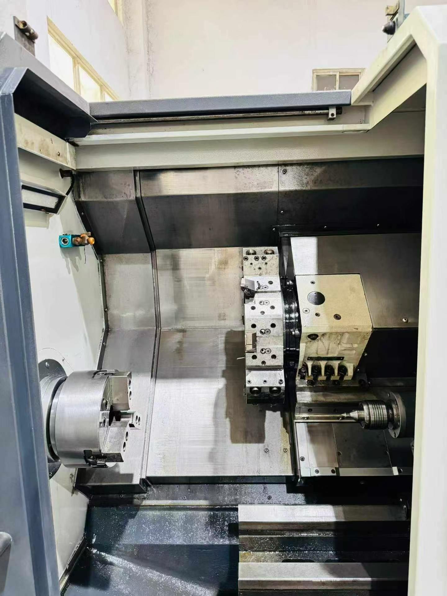 Used Hengda HL 202-T 360 Turret-Type CNC Lathe with KND K 1000 TCi-D Control photo 3