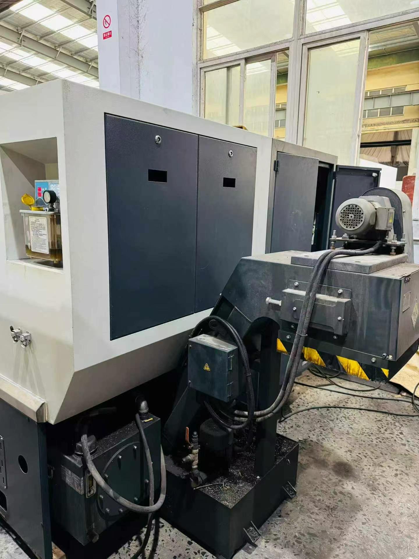 Used Hengda HL 202-T 360 Turret-Type CNC Lathe with KND K 1000 TCi-D Control photo 7