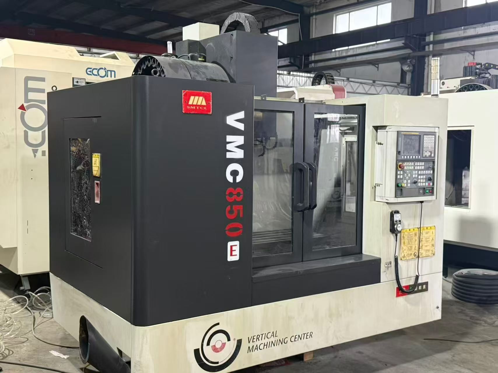 Used Shenyang VMC 850 E Vertical Machining Center with FANUC 0i Mate-MD photo 4