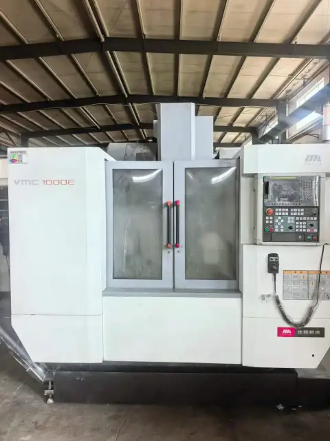 เครื่องแมชชีนนิ่งเซ็นเตอร์แนวตั้ง 4 แกน SMTCL Shenyang VMC 1000 E มือสอง พร้อม FANUC 0i-MF Plus
