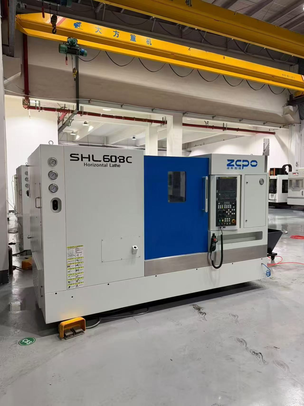 مخرطة CNC للخراطة والتفريز Anhui Zhuopu SHL 60 BC-500 مستعملة مع FANUC TF Plus، برج أدوات دوارة سيرفو BMT 55 من 12 محطة