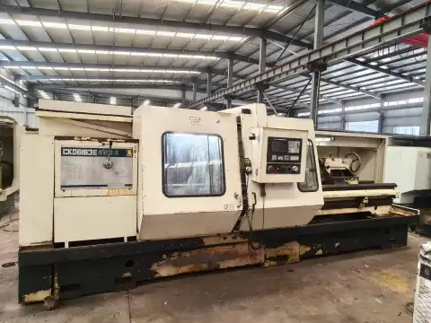 Torno horizontal CNC Pulisen CK 6163 E de 3 metros usado