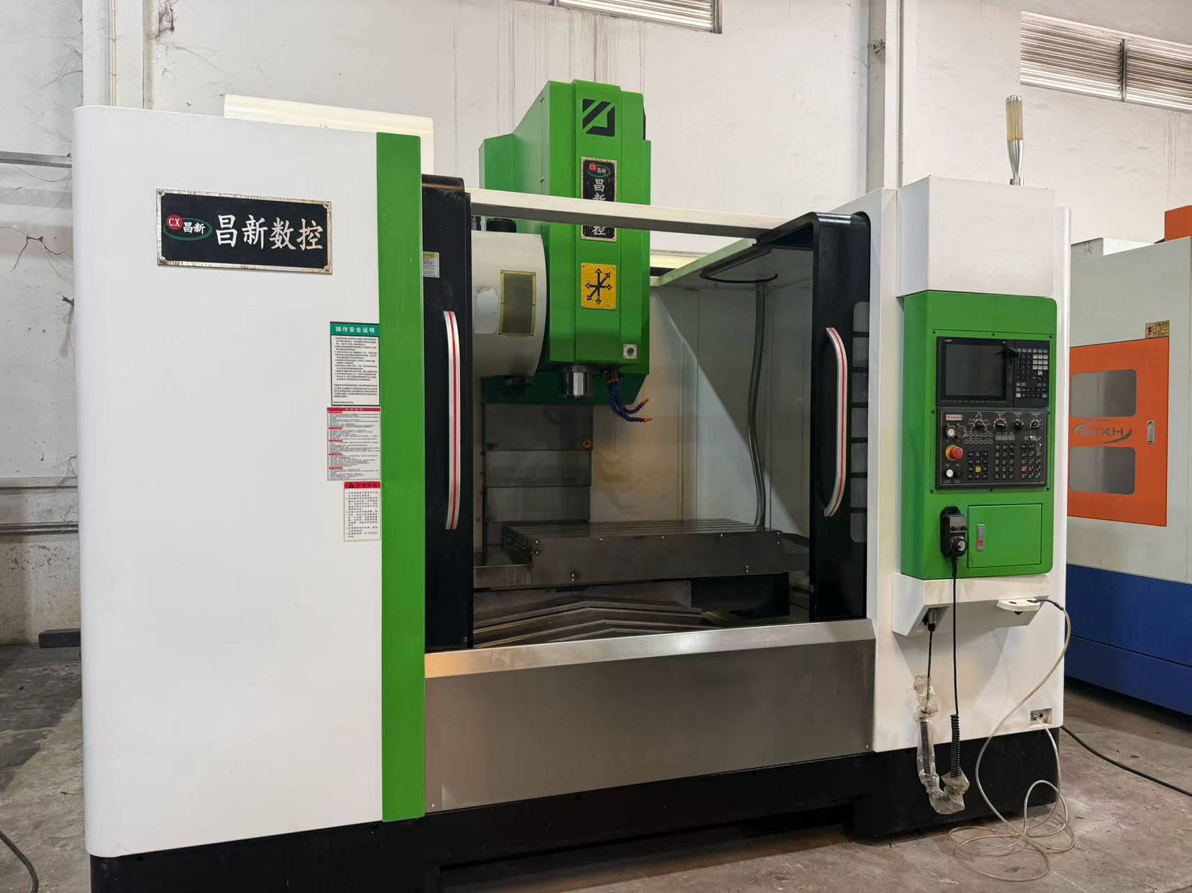Centro de mecanizado vertical Changxin 1160 de segunda mano con control Mitsubishi M 80