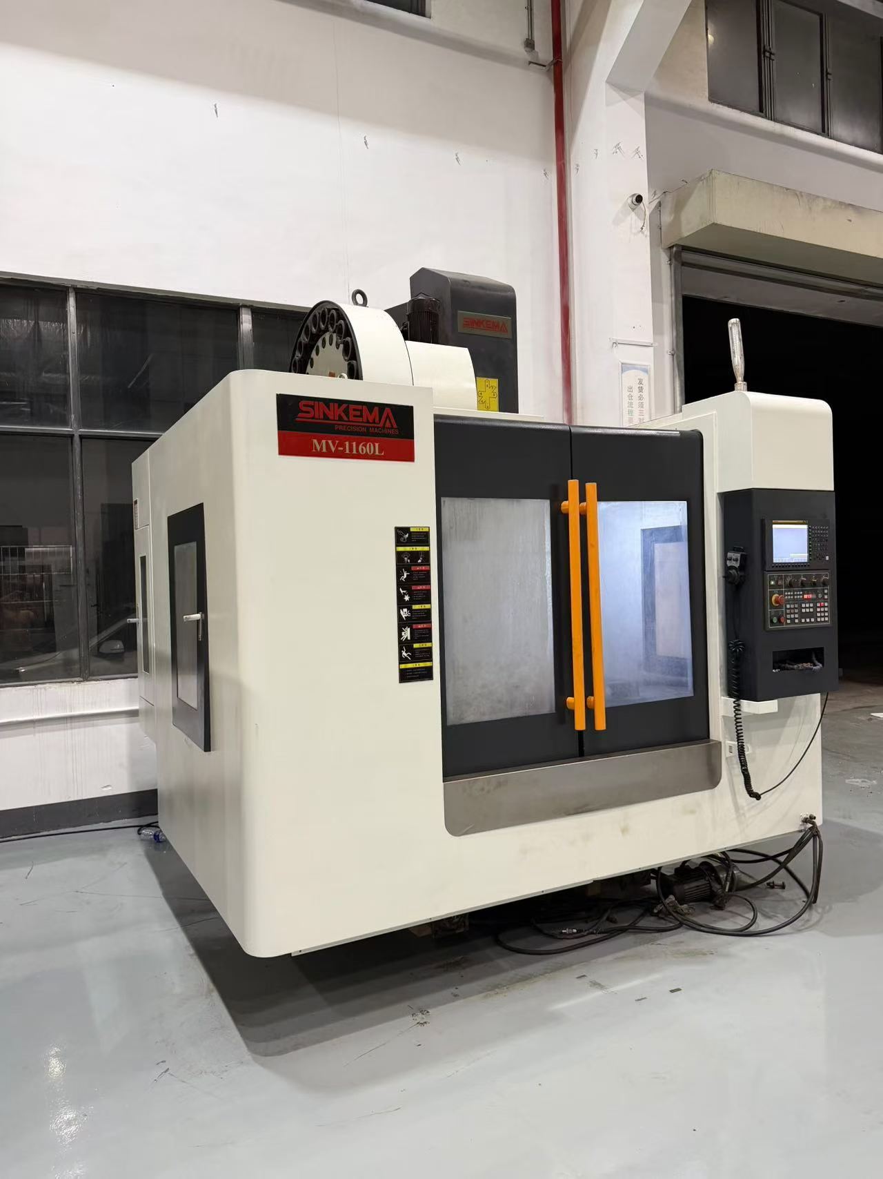 Used Xinkema MV-1160 L BT50 Vertical Machining Center with FANUC 0i-MF Plus photo 4
