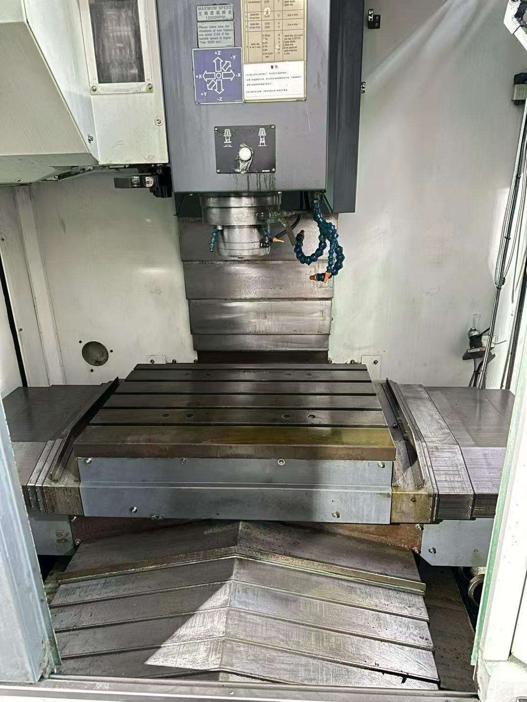 Used YCM NSV 66 A Vertical Machining Center with FANUC 200 FB High-Speed Mold Package photo 3