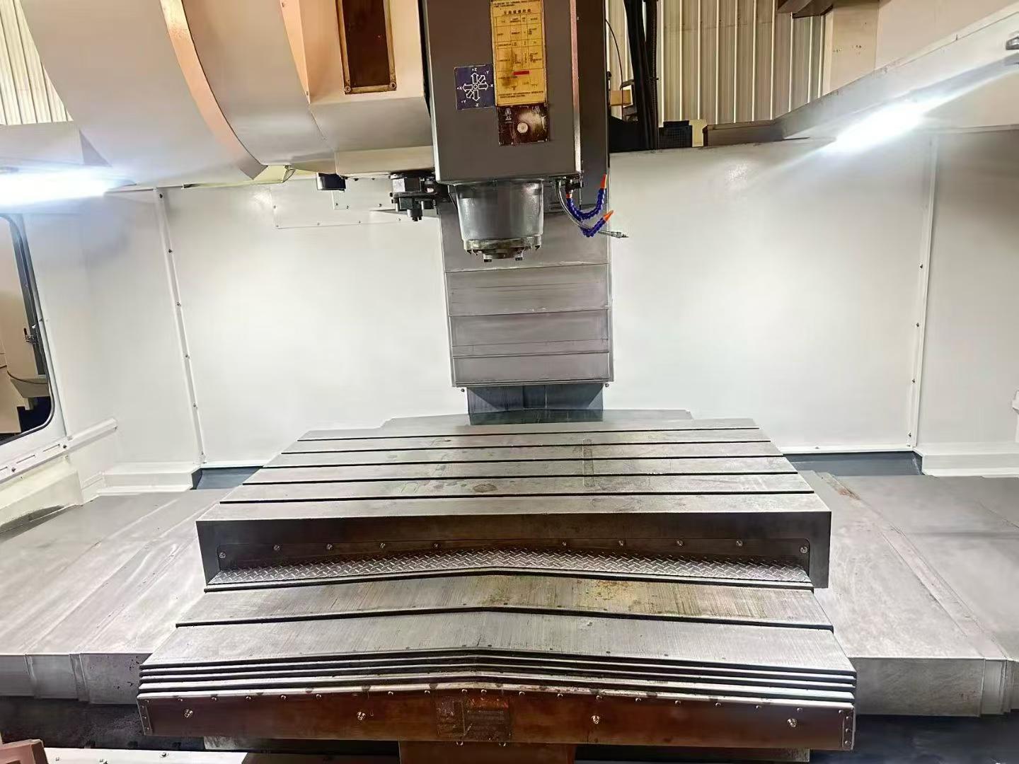 Used YCM TV158B Vertical Machining Center - BT50 Gear-Head 6,000 rpm Spindle, FANUC MXP-200 i Control, 24-Tool ATC, Inverted-T Base photo 2