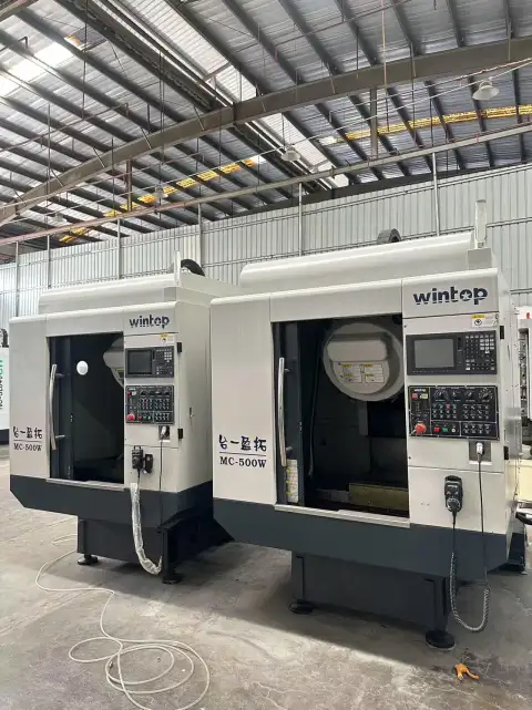 ศูนย์เจาะและต๊าปแนวดิ่ง Wintop T 500 มือสอง พร้อมระบบควบคุม Mitsubishi M 80