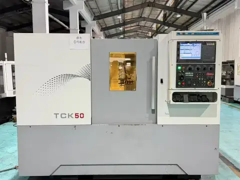 Used Zhongjie TCK 50 Slant-Bed Turret CNC Lathe