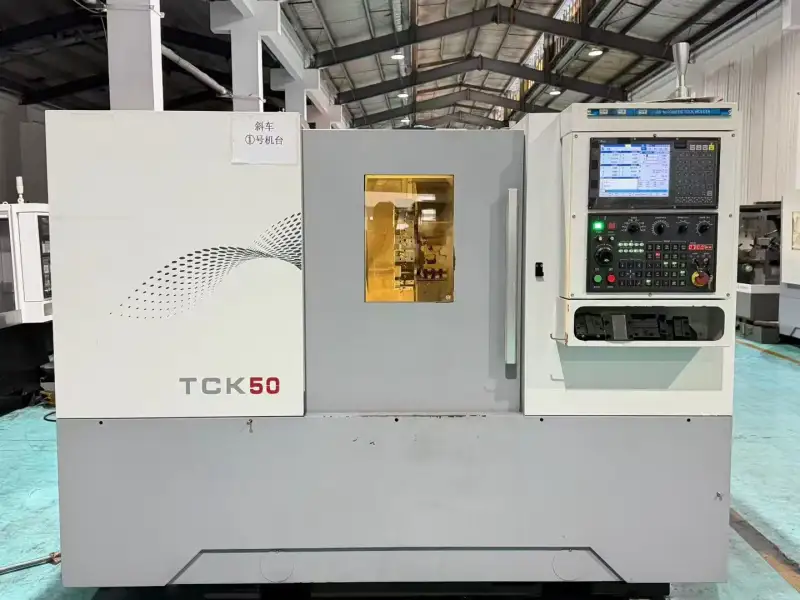 Used Zhongjie TCK 50 Slant-Bed Turret CNC Lathe photo 1