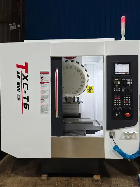Pusat Bor dan Tap Vertikal Taixin TXC-T 6 Bekas dengan Mitsubishi M 80