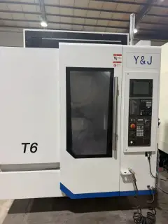 Used YUJIANG T 6 Vertical Drilling and Tapping Center with Mitsubishi M 80 photo 4