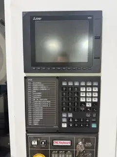 Used YUJIANG T 6 Vertical Drilling and Tapping Center with Mitsubishi M 80 photo 3