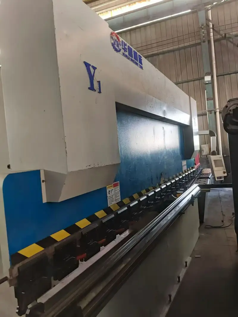 Used Hualu 100/4000 Three-Servo Press Brake with TP 10 CNC Control photo 1