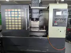 Used JIANGNAN JN-850 Vertical Machining Center with Mitsubishi M 70 Control photo 1