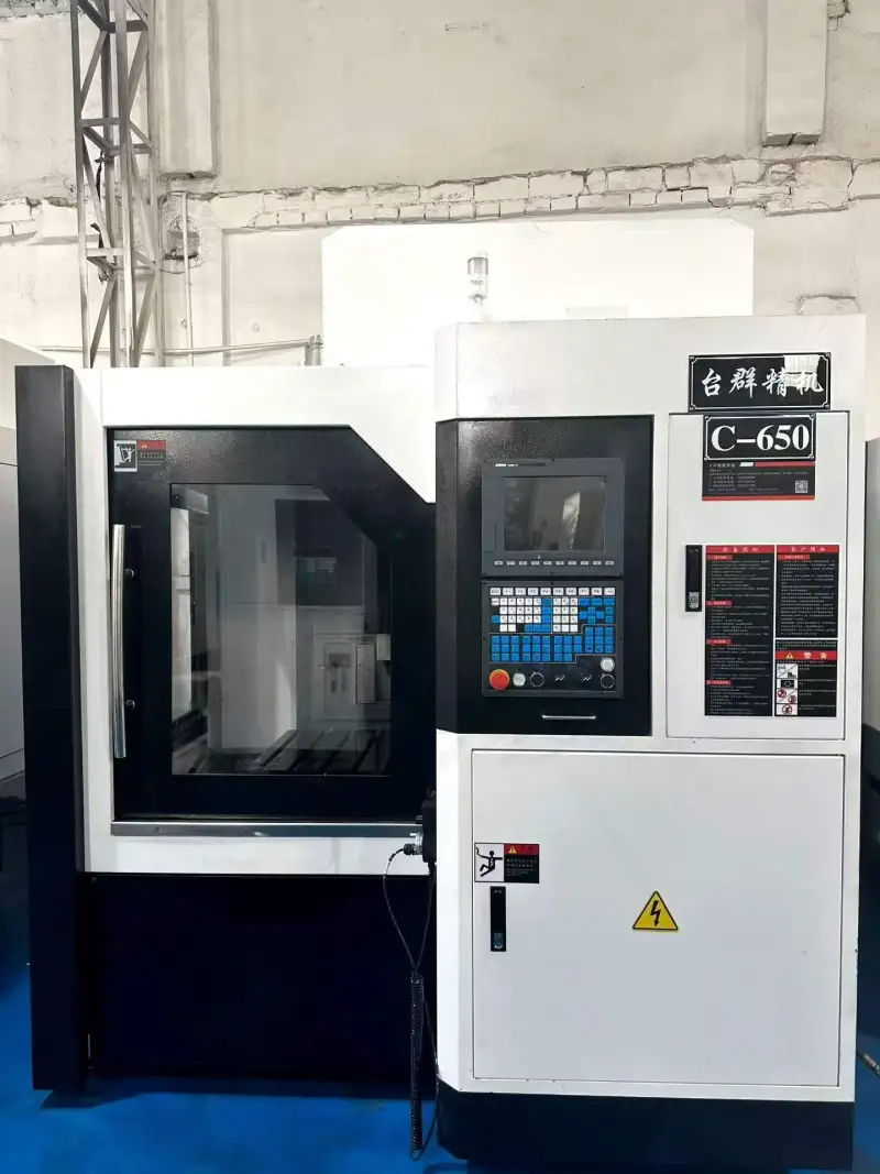 Used Taikan C-650 Vertical Machining Center with SYNTEC 21 MA-H photo 1