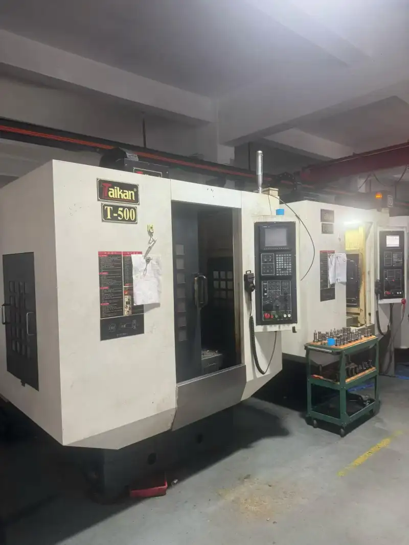 Used Taikan T-500 Vertical Drilling and Tapping Center with M 70 CNC Control, 20,000 rpm photo 1