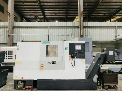 Torno horizontal CNC tipo torreta Feeler FTC-450 de segunda mano con FANUC 0i-TF Plus