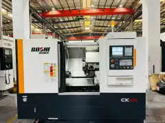 Used Baoji CK 40 S Slant-Bed Turret CNC Lathe with GSK 988 Control photo 2