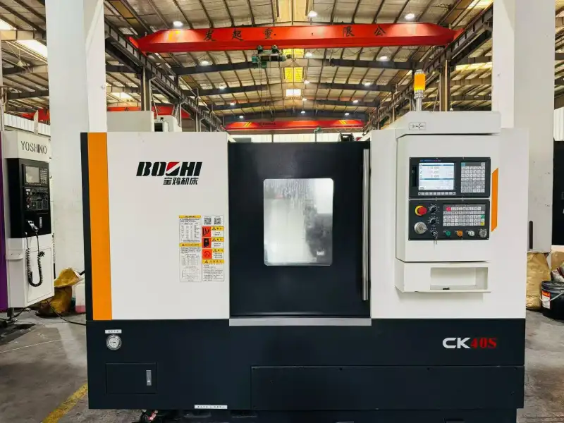 Used Baoji CK 40 S Slant-Bed Turret CNC Lathe with GSK 988 Control photo 1